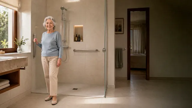 Mujer mayor en un baño adaptado con ducha a ras de suelo y barras de apoyo